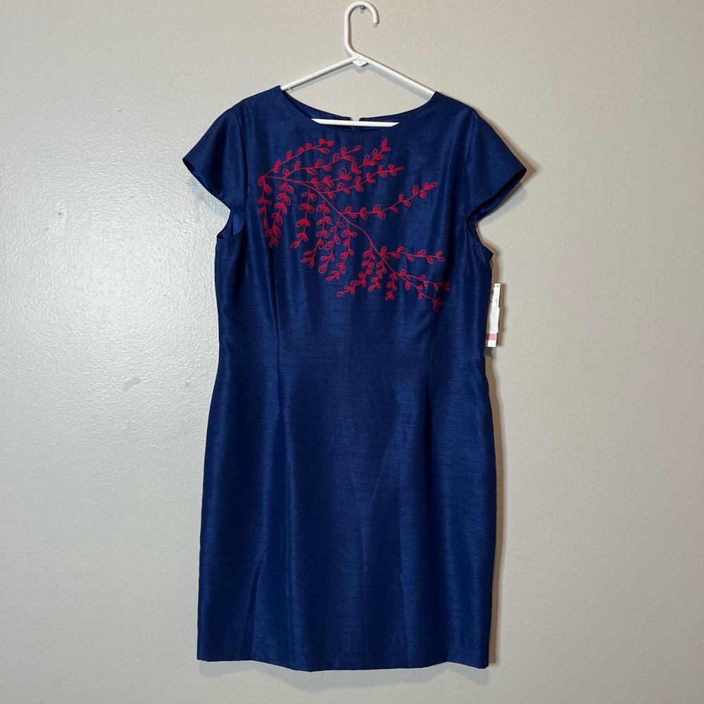 Navy blue, with a touch of a beautiful red on the front